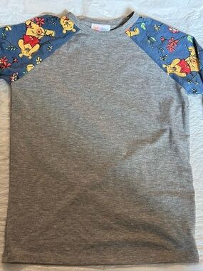 LuLaRoe Grey Raglan Tee with Blue Pooh-Print Sleeves